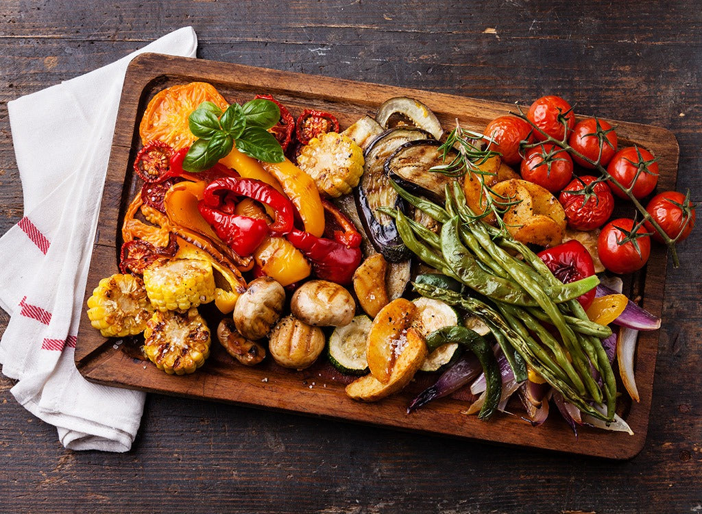 Grilled vegetables on a wooden board