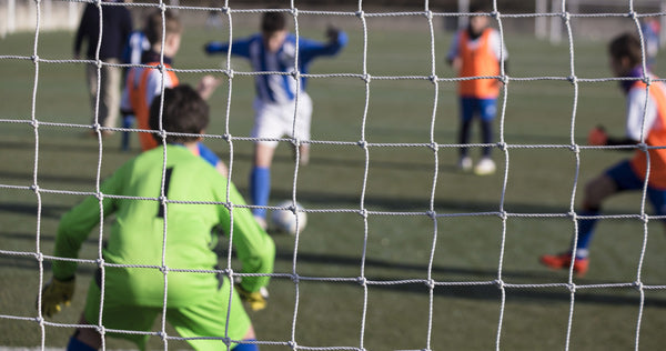kids playing football