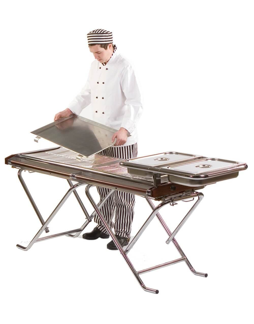 Chef using pan support and griddle on Cinders BBQ