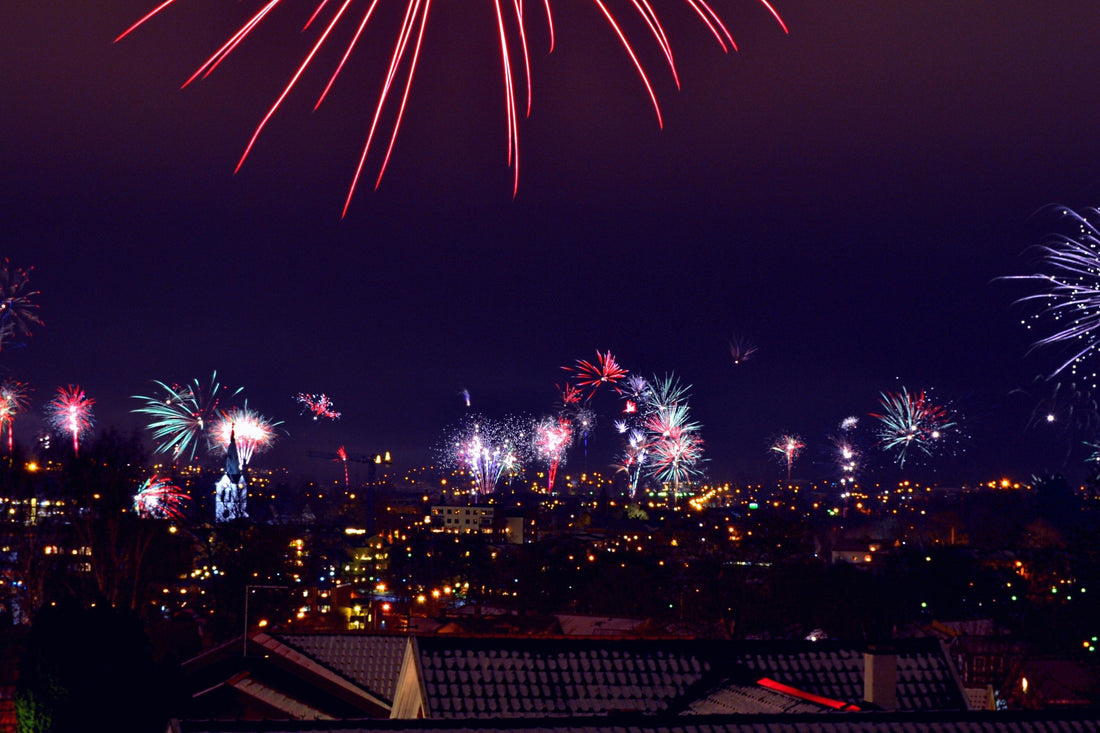 Fireworks across a townscape