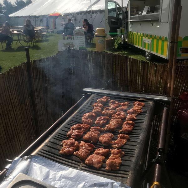 Delicious Food Cooking on Cinders BBQ Grill