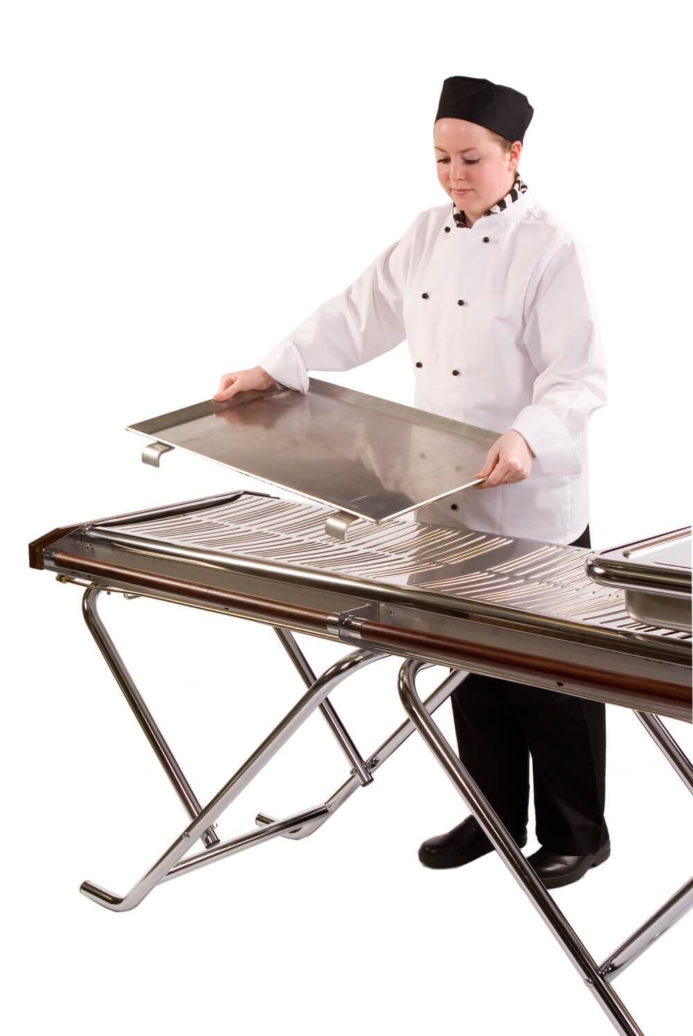 Caterer cooking on Cinders griddle at outdoor event